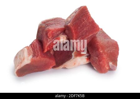 Studio shot of chunks of lamb cut out against a white background - John Gollop Stock Photo