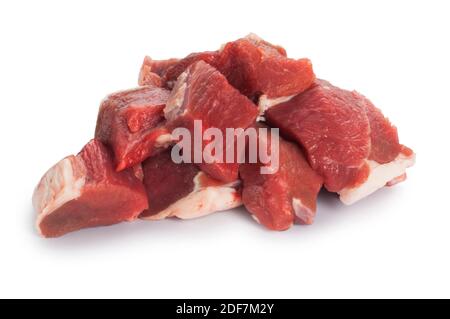 Studio shot of chunks of lamb cut out against a white background - John Gollop Stock Photo