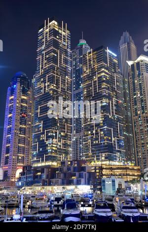 DUBAI, UAE - NOVEMBER 15: The night illumination of Dubai Marina on November 15, 2019 in Dubai, UAE Stock Photo