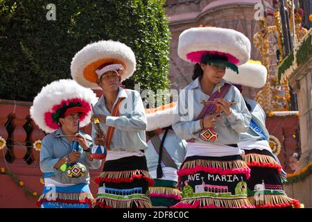 Dance troupes come from all parts of Mexico representing their region in the annual INDEPENDENCE DAY PARADE in September - SAN MIGUEL DE ALLENDE, MEXI Stock Photo