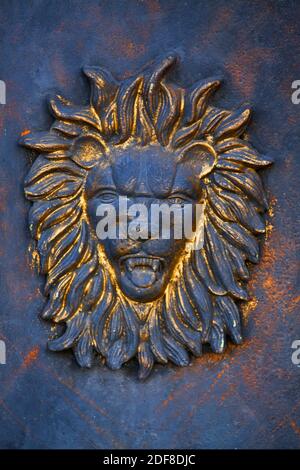 A METAL DOOR WITH LION at the patrons mansion at the RUINS of the MINA SANTA BRIGIDA MINE - MINERAL DE POZOS,  GUANAJUATO, MEXICO Stock Photo