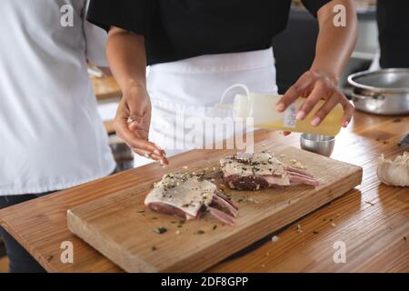 Divserse group of chefs in kitchen Stock Photo