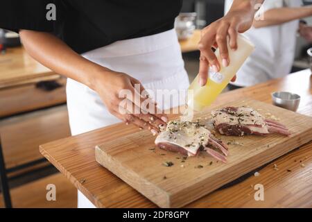 Divserse group of chefs in kitchen Stock Photo