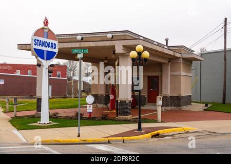 Rochelle, Illinois / United States - November 27th, 2020:  The 1918 Standard Oil Gas Station in small Midwest town. Stock Photo