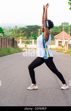 Active woman perform a stretching exercise Stock Photo - Alamy