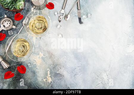 Valentines Day. Flat lay background with champagne and red rose flower petals Stock Photo