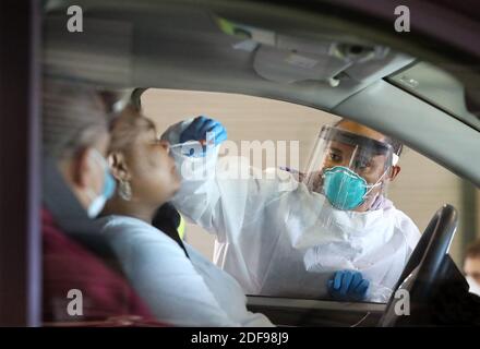NO FILM, NO VIDEO, NO TV, NO DOCUMENTARY - Emory Hospital RN Aisha Bennett takes a nasal swab at a pilot large scale drive-through COVID-19 testing site in the Georgia International Horse Park on Thursday, April 16, 2020, in Conyers, GA, USA.Photo by Curtis Compton/Atlanta Journal-Constitution/TNS/ABACAPRESS.COM Stock Photo