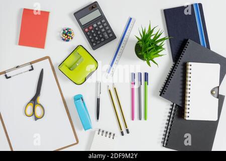 Multiple stationery items for office and school. Top view flat lay of office supply. Stock Photo