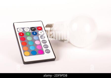 Remote control for light emitting diode LED theme light bulb isolated on the white background Stock Photo