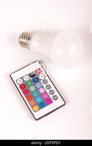 Remote control for light emitting diode LED theme light bulb isolated on the white background Stock Photo