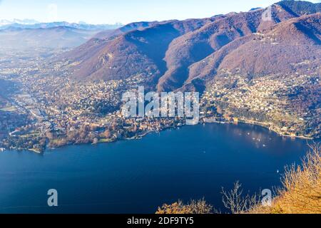 Winter skyline of Como Lake. View from Volta Lighthouse viewpoint, Brunate village, Como, Lombardy province, Italy. Swiss Alps on the background Stock Photo