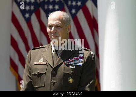 General Gustave Perna listens as United States President Donald J. Trump delivers remarks regarding Coronavirus vaccine developments in the Rose Garden of the White House in Washington D.C., U.S. on Friday, May 15, 2020. Credit: Stefani Reynolds / CNP Stock Photo