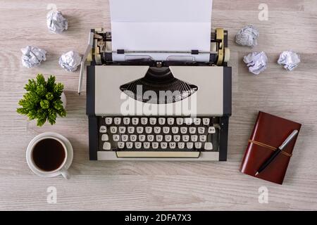 Overhead view of old typewriter with paper sheet. Stock Photo