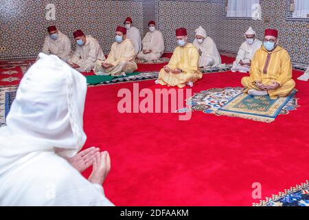 King Mohammed VI of Morocco performs Eid Al-Fitr prayer with his son, crown Prince Moulay El Hassan of Morocco and Prince Moulay Rachid of Morocco at the Mosquee, on May 24, 2020 in Rabat. Morocco. Photo via ABACAPRESS.COM Stock Photo