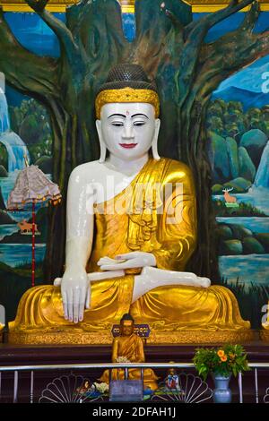 A BUDDHA STATUE at the SHWEMAWDAW PAYA is a 1000 years old and 114 meters high - BAGO, MYANMAR Stock Photo