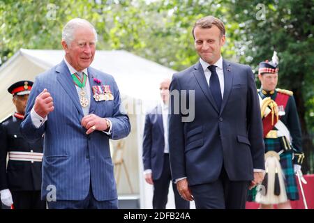 Britain's Prince Charles, Prince of Wales (L) and French President Emmanuel Macron (R) lay wreaths at the statue of former French president Charles de Gaulle at Carlton Gardens in central London on June 18, 2020 during a visit to mark the anniversary of former de Gaulle's appeal to French people to resist the Nazi occupation. - Macron visited London on June 18 to commemorate the 80th anniversary of former French president Charles de Gaulle's appeal to French people to resist the Nazi occupation during World War II. Photo by Tolga AKMEN/Pool/ABACAPRESS.COM Stock Photo