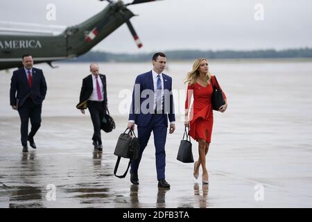 White House special assistant to the president Nick Luna, second from right, walks with White House press secretary Kayleigh McEnany to board Air Force One with President Donald Trump, Saturday, June 20, 2020, at Andrews Air Force Base, Md. Trump is en route to a campaign rally in Tulsa, Okla. White House social media director Dan Scavino, left, walks with White House Senior Adviser Stephen Miller second from left. Tulsa, Okla. USA. Photo by Evan Vucci/Pool via ABACAPRESS.COM Stock Photo