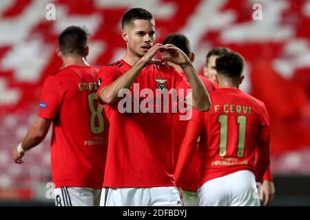 Lisbon. 3rd Dec, 2020. Julian Weigl of SL Benfica celebrates after scoring team's fourth goal during the UEFA Europa League group D football match between SL Benfica and Lech Poznan in Lisbon, Portugal on Dec. 3, 2020. Credit: Pedro Fiuza/Xinhua/Alamy Live News Stock Photo