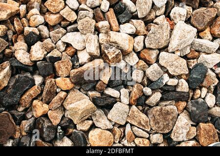 Sea stones background of the many beautiful colored stones. Texture Stock Photo