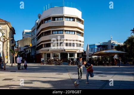 April 22, 2019, Limassol, Cyprus. Children play soccer in the city square . Stock Photo