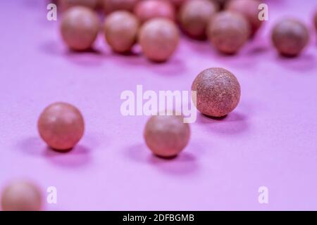 A pile of oranges sitting on top of a wooden table Stock Photo