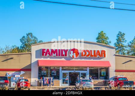 Augusta, Ga USA - 12 03 20: Family Dollar retail store with people and cars Stock Photo