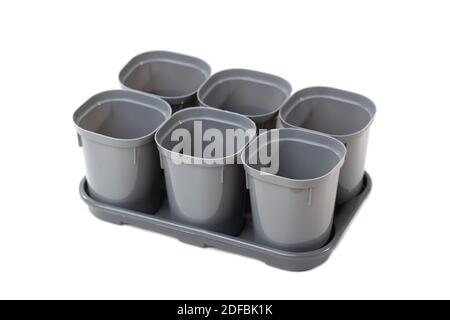 Empty new plastic plant pots isolated on white background Stock Photo