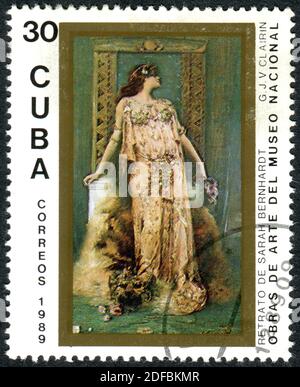 CUBA - CIRCA 1982: A stamp printed in Cuba, shown the painting of 'Portrait of Sarah Bernhardt', by artist Georges Jules Victor Clairin, circa 1982 Stock Photo