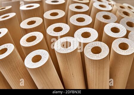 Wooden flower from turned legs, concept. Turned wooden legs folded like a flower. Close-up Stock Photo