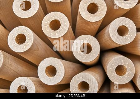 Wooden flower from turned legs, concept. Turned wooden legs folded like a flower. Close-up Stock Photo