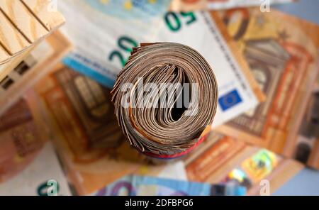 Roll of a euro banknotes of European Union on a money background, face value 10, 20, 50 euros Stock Photo