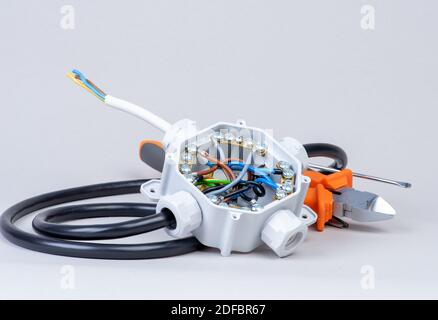 Components for use in electrical installations, junction box, cables and tools Stock Photo