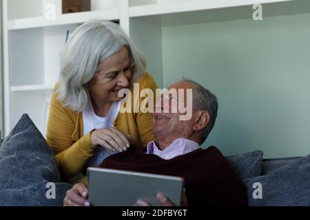 Senior caucasian couple using digital tablet at home Stock Photo