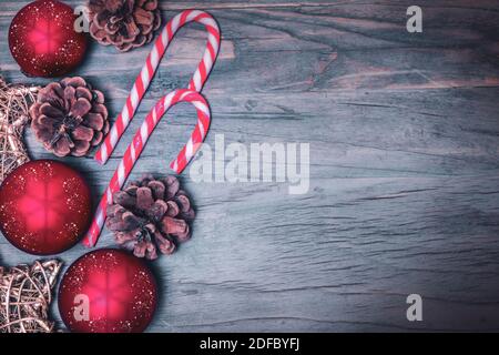 Christmas decorations on vintage wooden background. Stock Photo