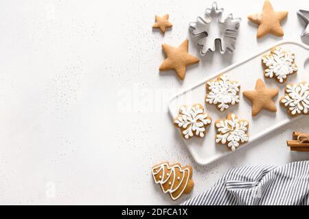 Christmas homemade glazed cookies on white background. View from above. Flat lay. Space for text. Stock Photo