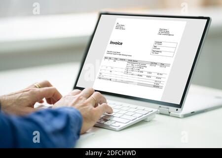 Digital Invoice Business Bill Payment On Laptop Stock Photo