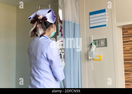 Nurse in hospital with blood products, infusion of donor blood. Stock Photo