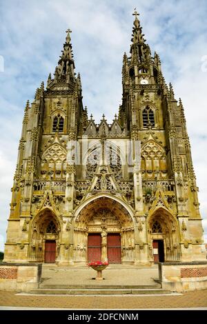 Impressive facade with two high towers of Notre-Dame de l'Epine Gothic basilica classified Unesco heritage site. Stock Photo