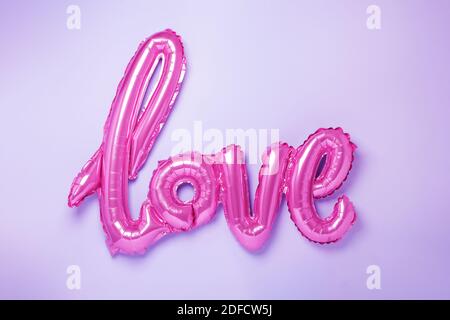 Balloons in the form of word Love in trendy neon colours. Valentines day celebration - Image Stock Photo