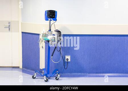 Mobile health diagnostic machine to check blood pressure and pulse at hospital ward corridor Stock Photo