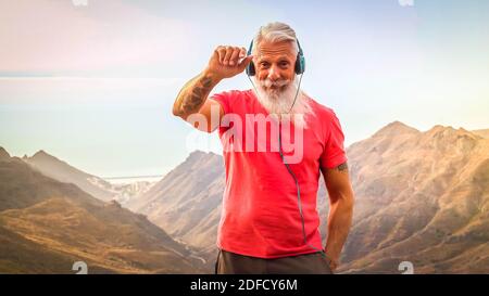 Senior man outdoor communicating via video call Stock Photo