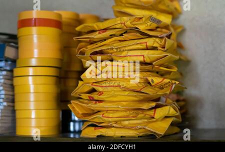 Lot of home made film reels posed on a shelf Stock Photo