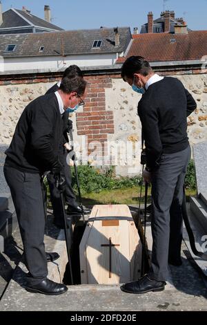 Funeral at evreux graveyard, france during covid-19 epidemic Stock Photo