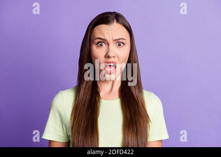 Photo of shocked person open mouth staring cant believe wear light green isolated on magenta color background Stock Photo