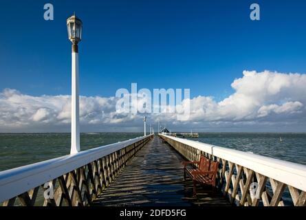 Yarmouth Pier on Isle of Wight bathed in sun after heavy shower Stock Photo