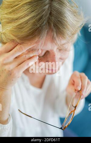 Woman suffering from headache. Stock Photo