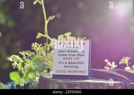 Inspirational quote with phrase - If you want your dreams to come true then wake up it is a beautiful morning. Blur background, retro style Stock Photo