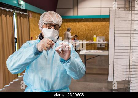 Pharmacist carries out an antigenic test for the detection of antigens of SARS-CoV-2, responsible for COVID-19, Angoulême, France, November 2020. Stock Photo