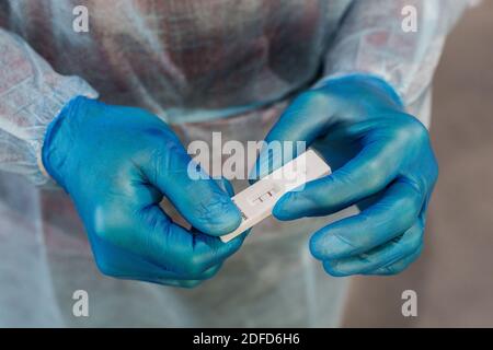 Pharmacist carries out an antigenic test for the detection of antigens of SARS-CoV-2, responsible for COVID-19, France, November 2020. Stock Photo