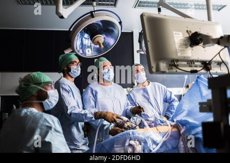 Kidney removal by laparoscopy from a living related donor, Bordeaux hospital, France. Stock Photo